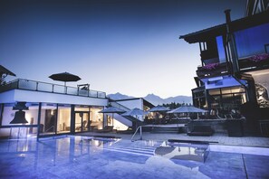 Indoor pool, outdoor pool, pool umbrellas, pool loungers