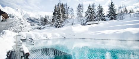 Indoor pool, outdoor pool, pool umbrellas, sun loungers