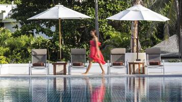 2 outdoor pools, open 7:00 AM to 7:00 PM, pool umbrellas, sun loungers