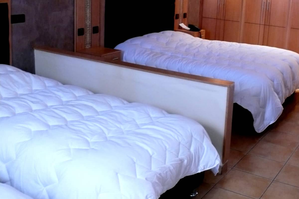 Quadruple Room | Minibar, in-room safe, blackout drapes, cribs (free)