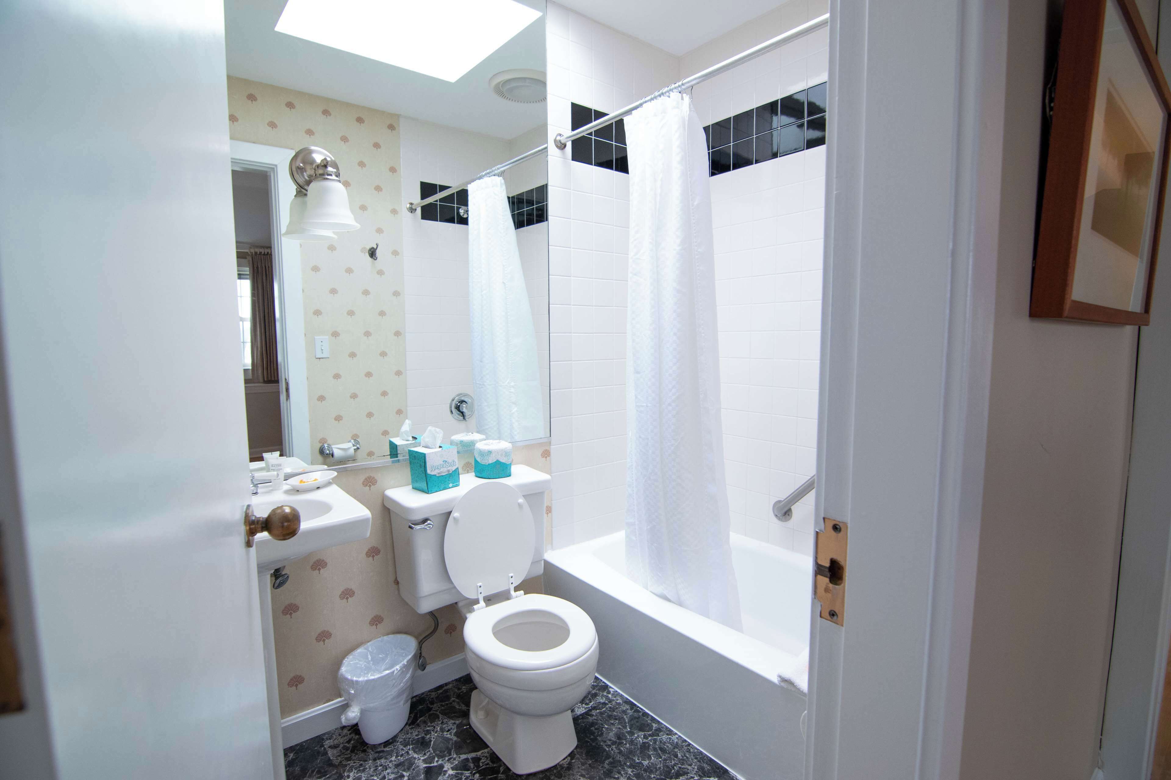 deluxe oceanview queen | bathroom | designer toiletries, hair dryer, bathrobes, towels