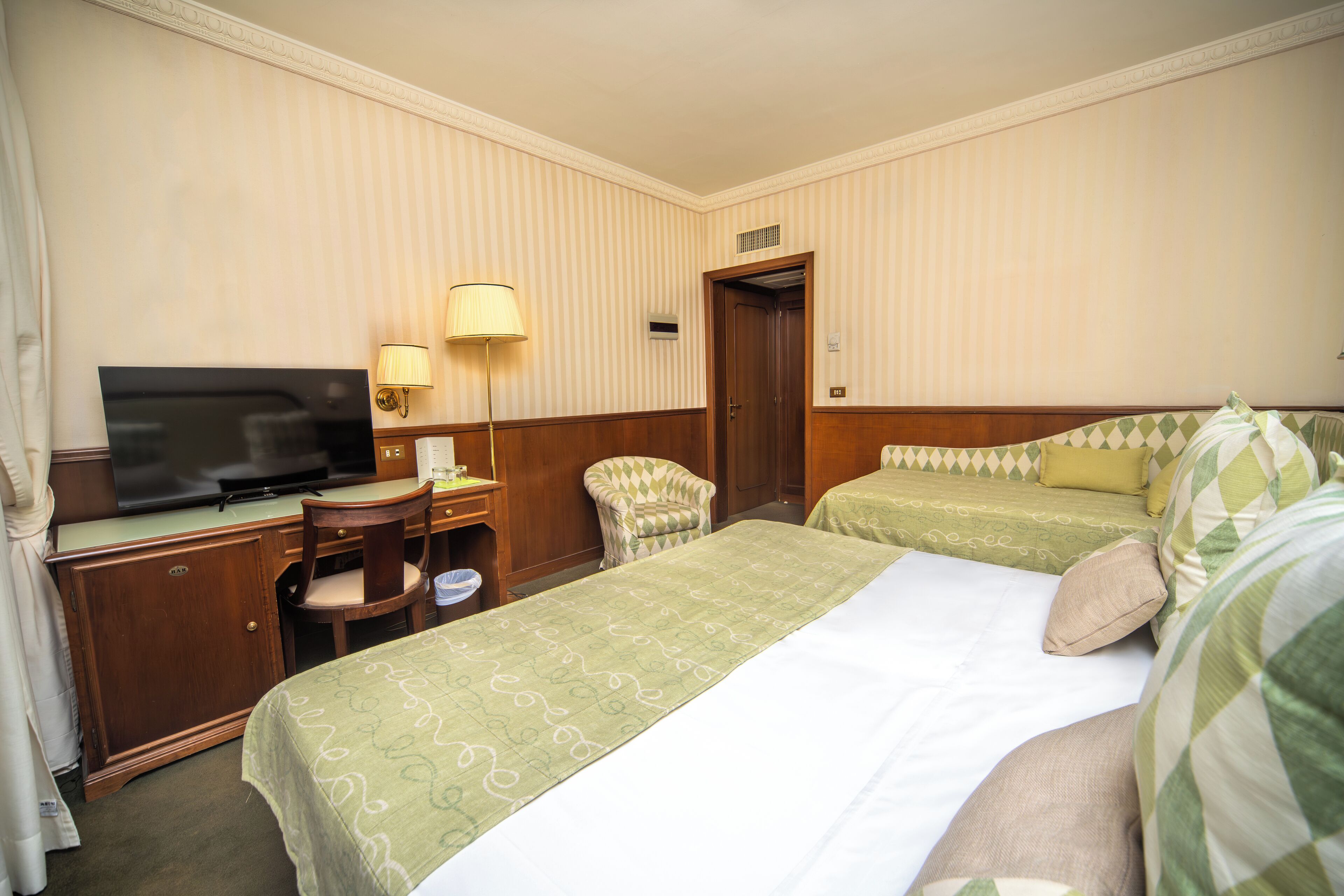 family triple room | 1 bedroom, minibar, in-room safe, desk