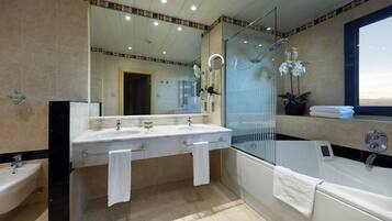 Eco-friendly toiletries, hair dryer, bidet, towels
