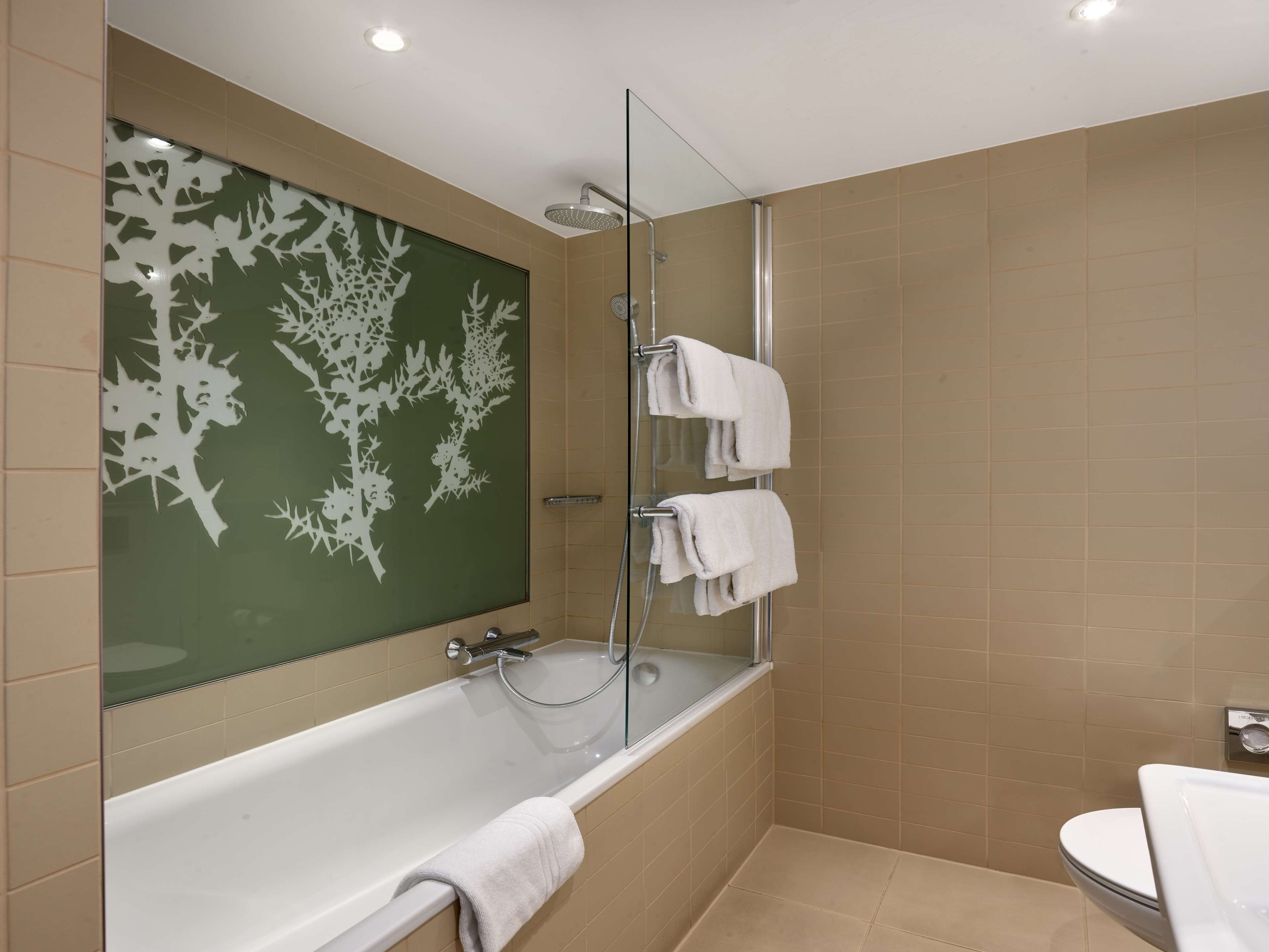 free toiletries, hair dryer, heated floors, towels