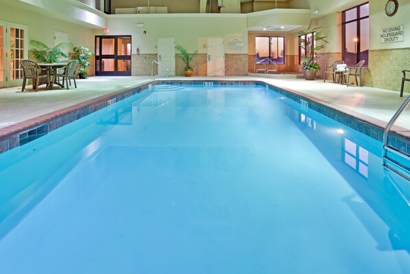 Indoor pool, open 8 AM to 11 PM, pool loungers