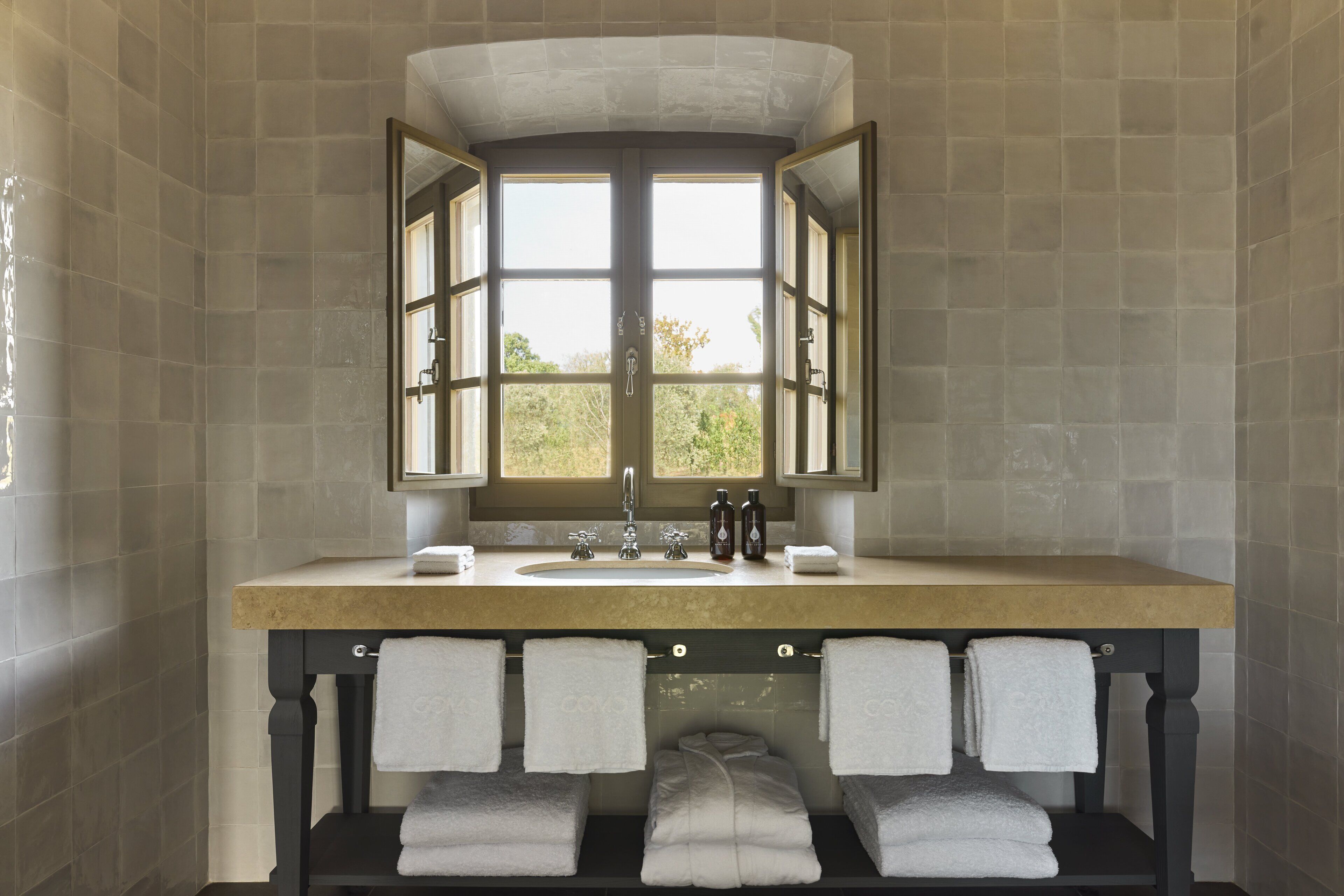 villa (san luigi) | bathroom | combined shower/bathtub, rainfall showerhead, free toiletries