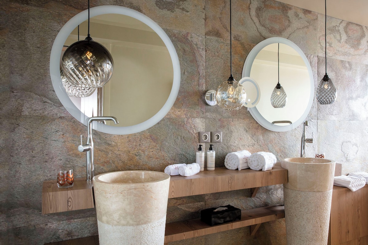 suite, 1 king bed with sofa bed, mountain view | bathroom | designer toiletries, hair dryer, bathrobes, slippers