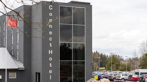 A modern hotel building with a large glass facade and a sign reading "Connect Hotel". - Aiden by Best Western Stockholm Arlanda Airport (Arlandastad)