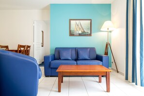 Apartment, 1 Bedroom (Duplex) | Living area | 55-inch TV with cable channels - Residence Ker Juliette (Pornichet)