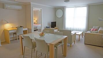 Standard Apartment, 2 Bedrooms, Non Smoking, City View | Living area | 40-inch flat-screen TV with cable channels, TV, DVD player