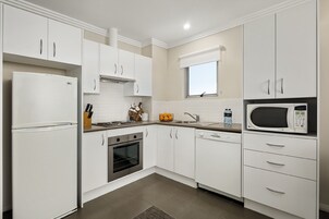 Standard Apartment, 1 Bedroom, Non Smoking, City View | Private kitchen | Full-size fridge, microwave, oven, stovetop