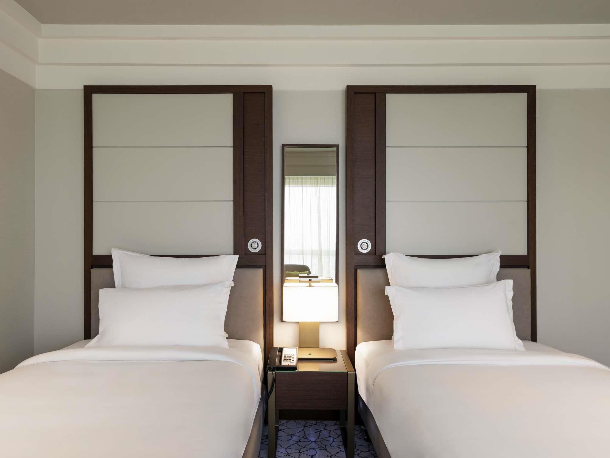 Executive Room, 2 Twin Beds | 1 bedroom, down comforters, pillowtop beds, minibar