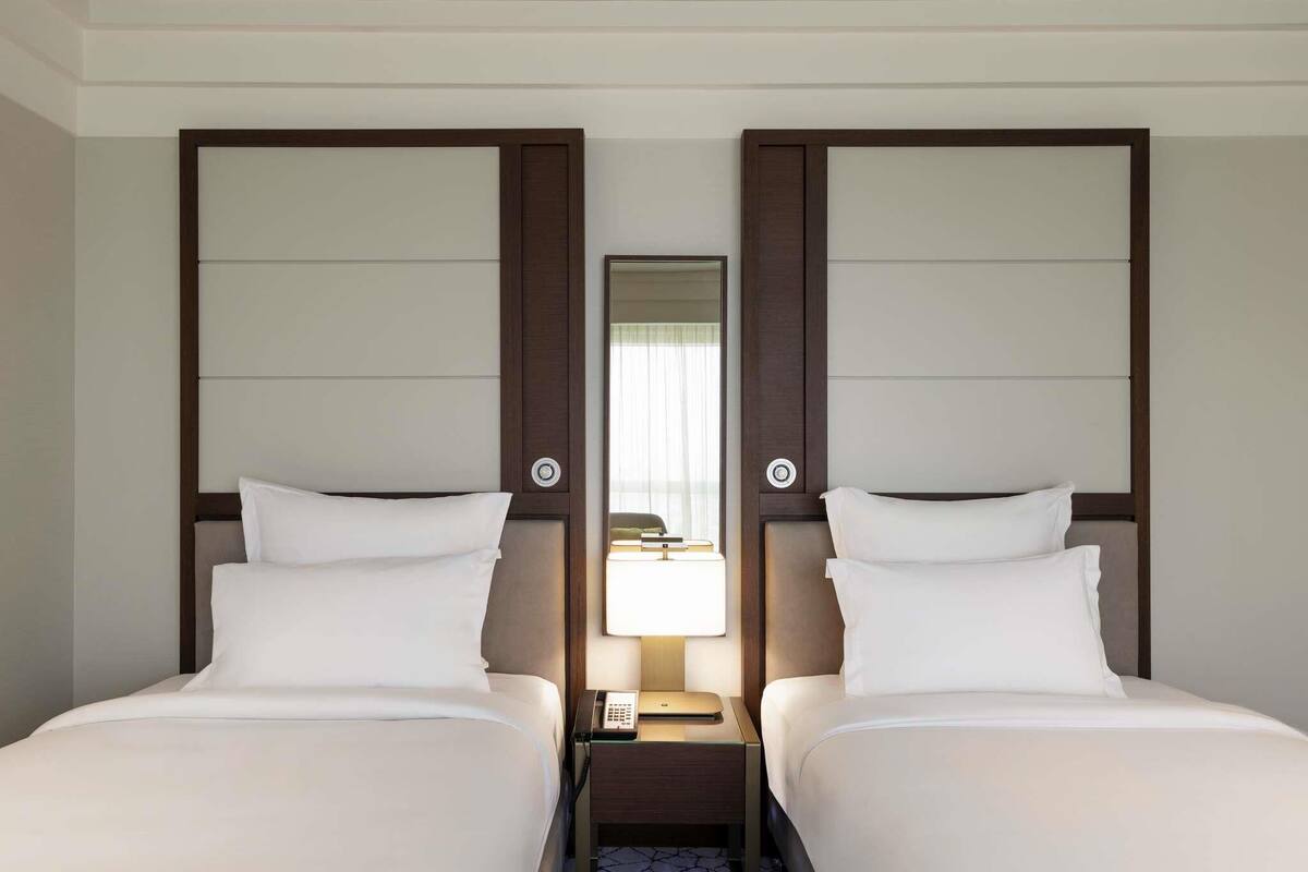 Executive Room, 2 Twin Beds | 1 bedroom, down comforters, pillowtop beds, minibar