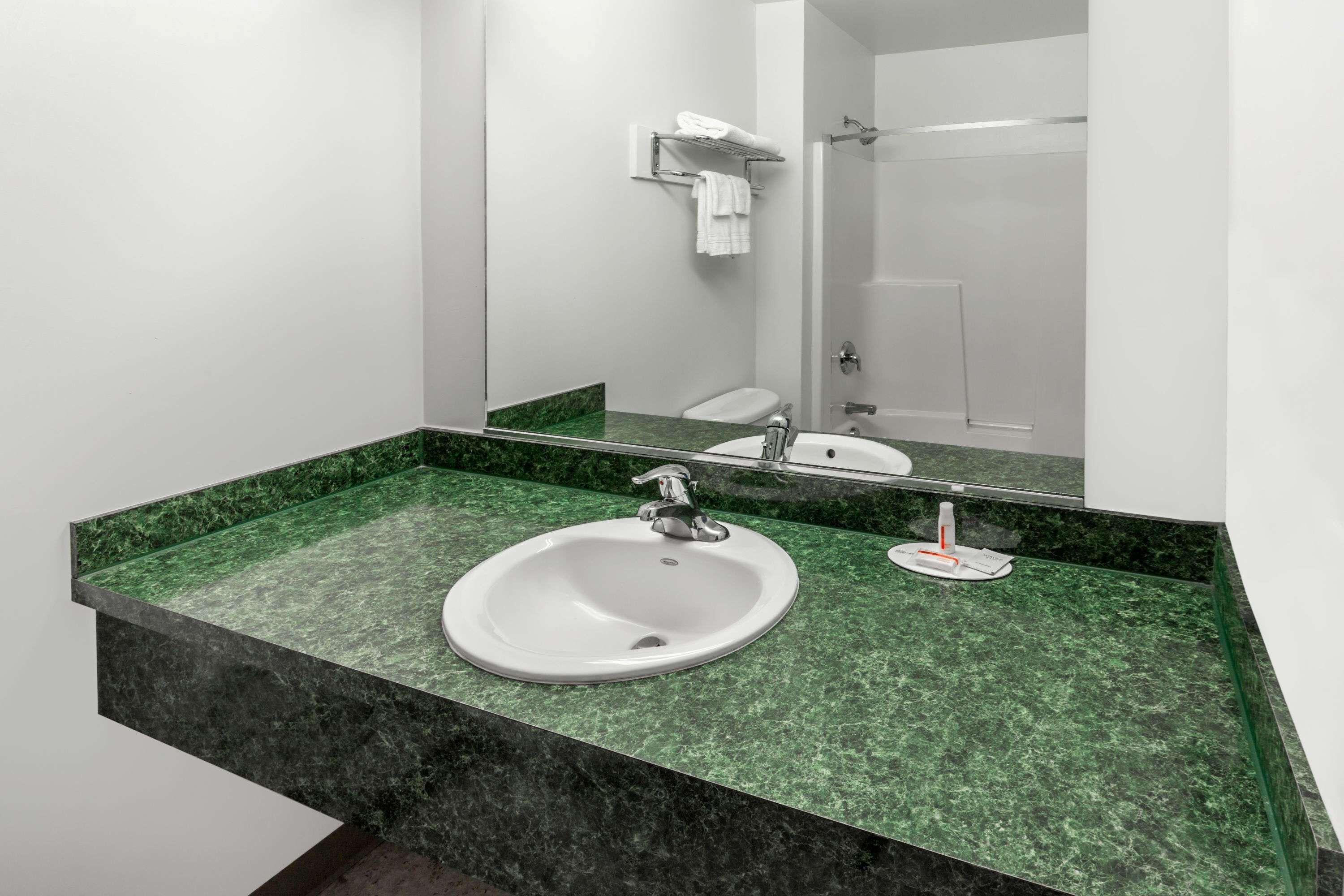 combined shower/bathtub, free toiletries, hair dryer, towels