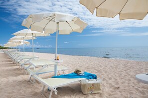 Private beach, sun loungers, beach umbrellas