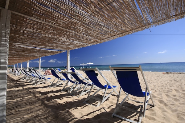 Private beach, sun loungers, beach umbrellas