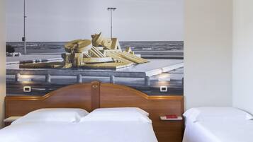 Down comforters, in-room safe, desk, blackout drapes