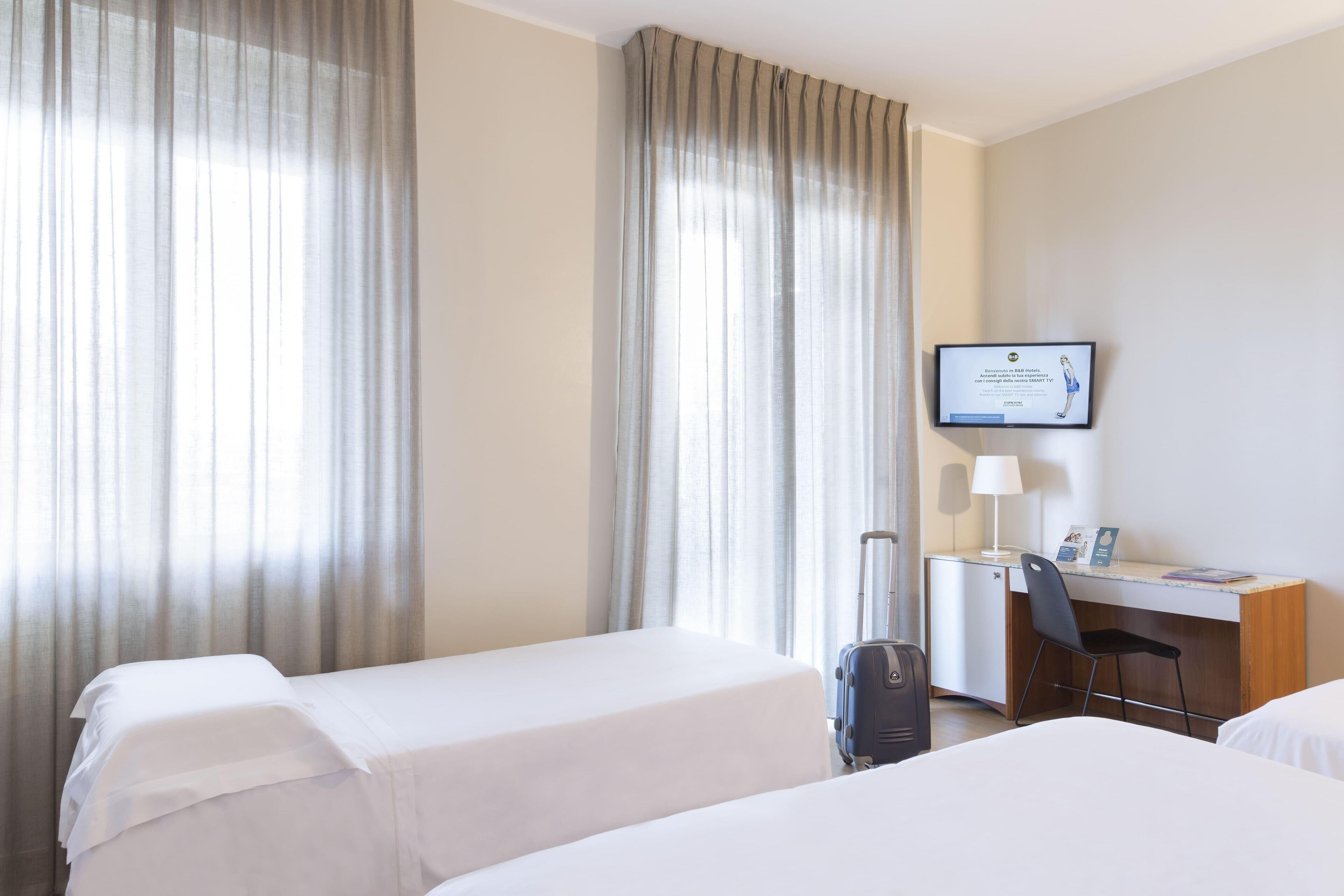 Down comforters, in-room safe, desk, blackout drapes