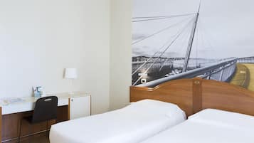 Down comforters, in-room safe, desk, blackout drapes