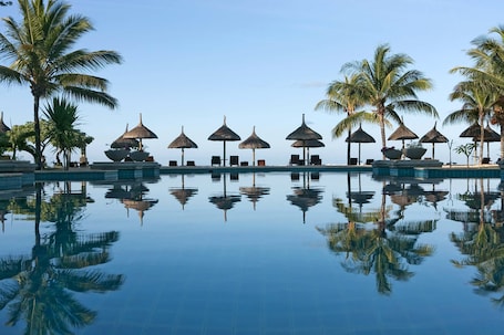 Outdoor pool, pool umbrellas, sun loungers