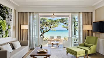 On the beach, white sand, free beach cabanas, beach towels