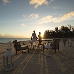On the beach, white sand, free beach cabanas, beach towels