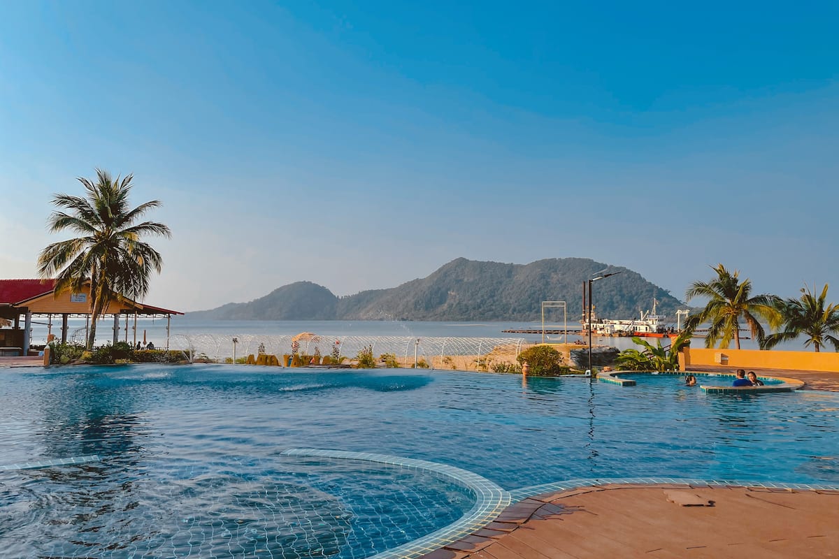 outdoor pool, pool umbrellas, pool loungers