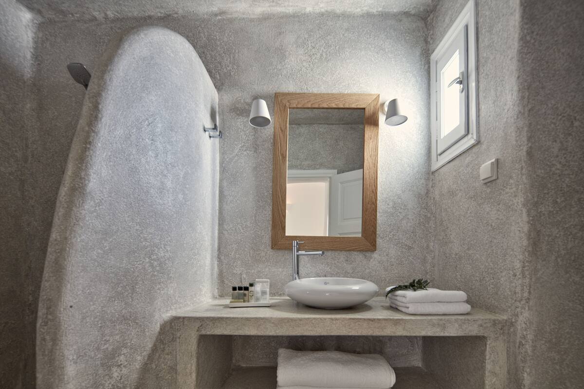 shower, hair dryer, bathrobes, slippers