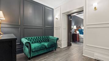 Clos St-Louis Suite | Living area | 30-inch flat-screen TV with cable channels, TV, DVD player
