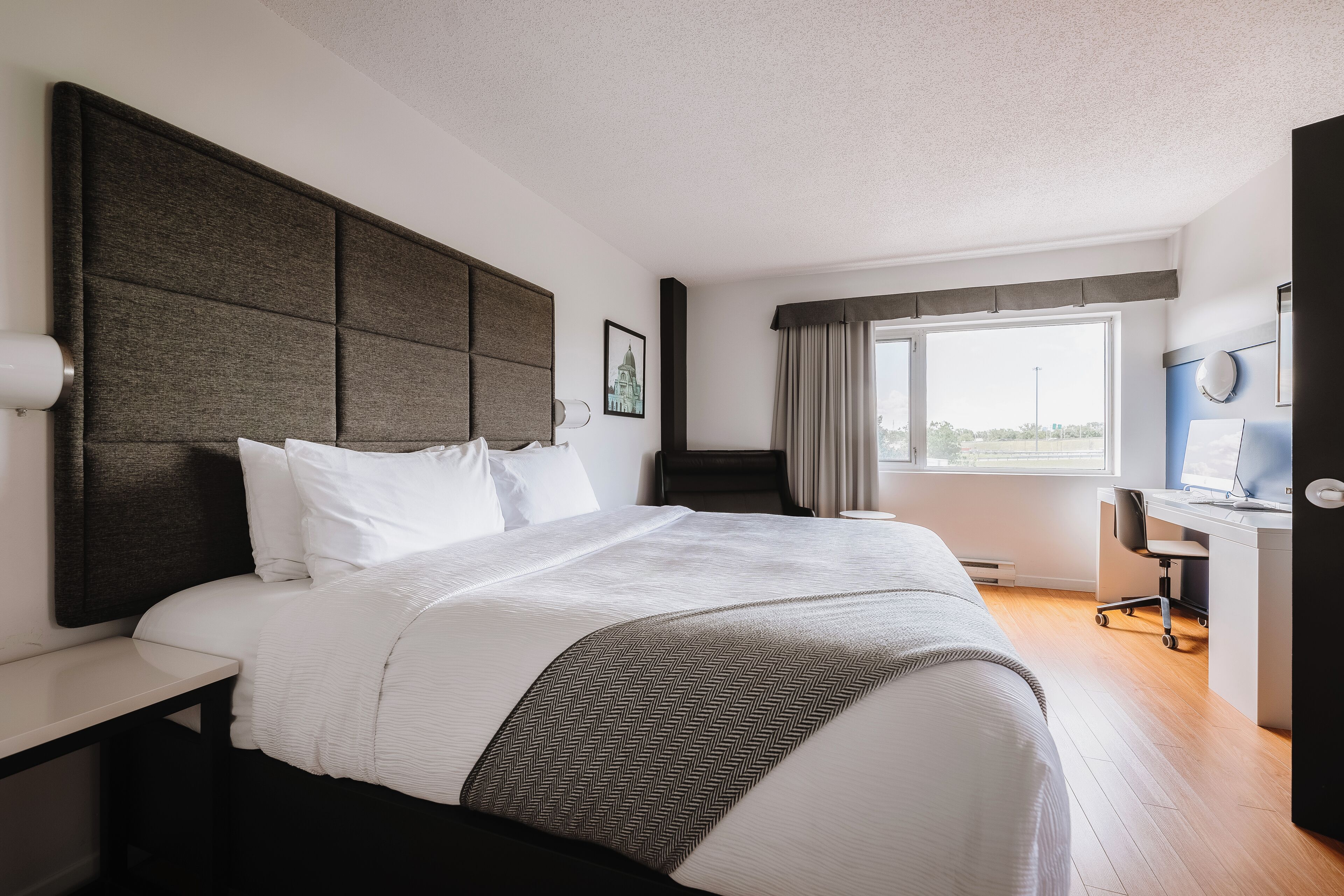 deluxe suite, 1 king bed | in-room safe, desk, laptop workspace, blackout curtains