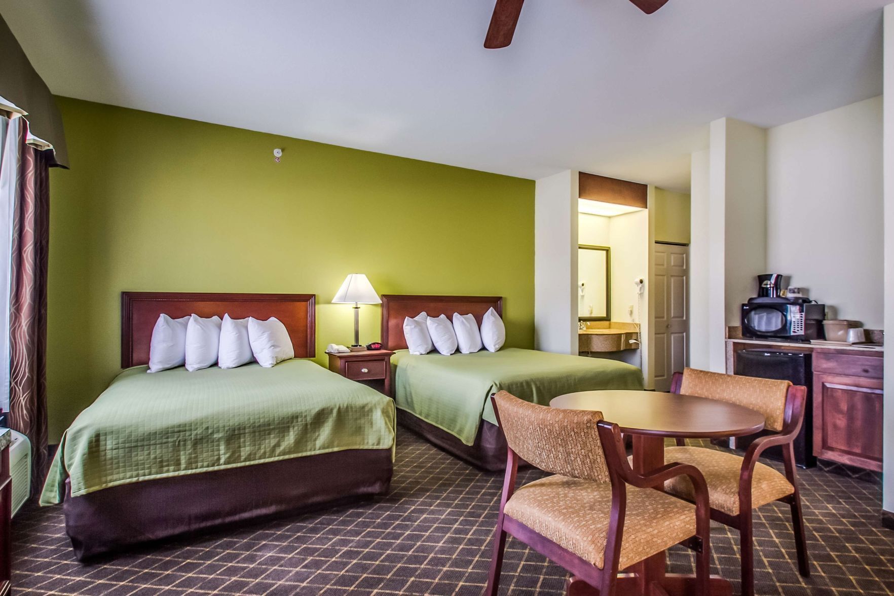 Pillowtop beds, desk, laptop workspace, WiFi