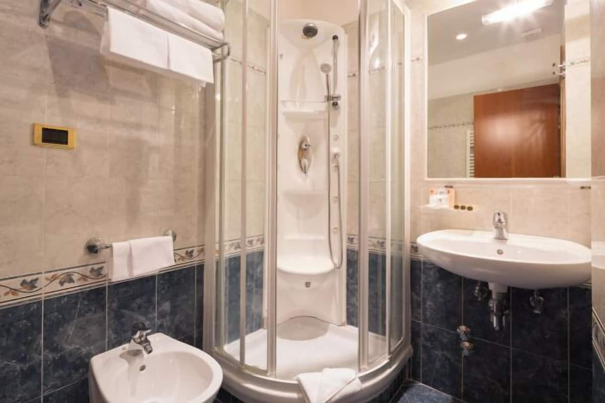 Bathroom | Shower, free toiletries, hair dryer, bidet