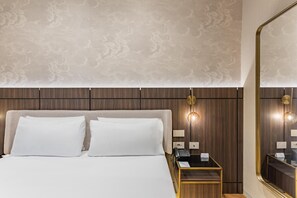 Literie hypoallergénique, minibar, coffres-forts dans les chambres