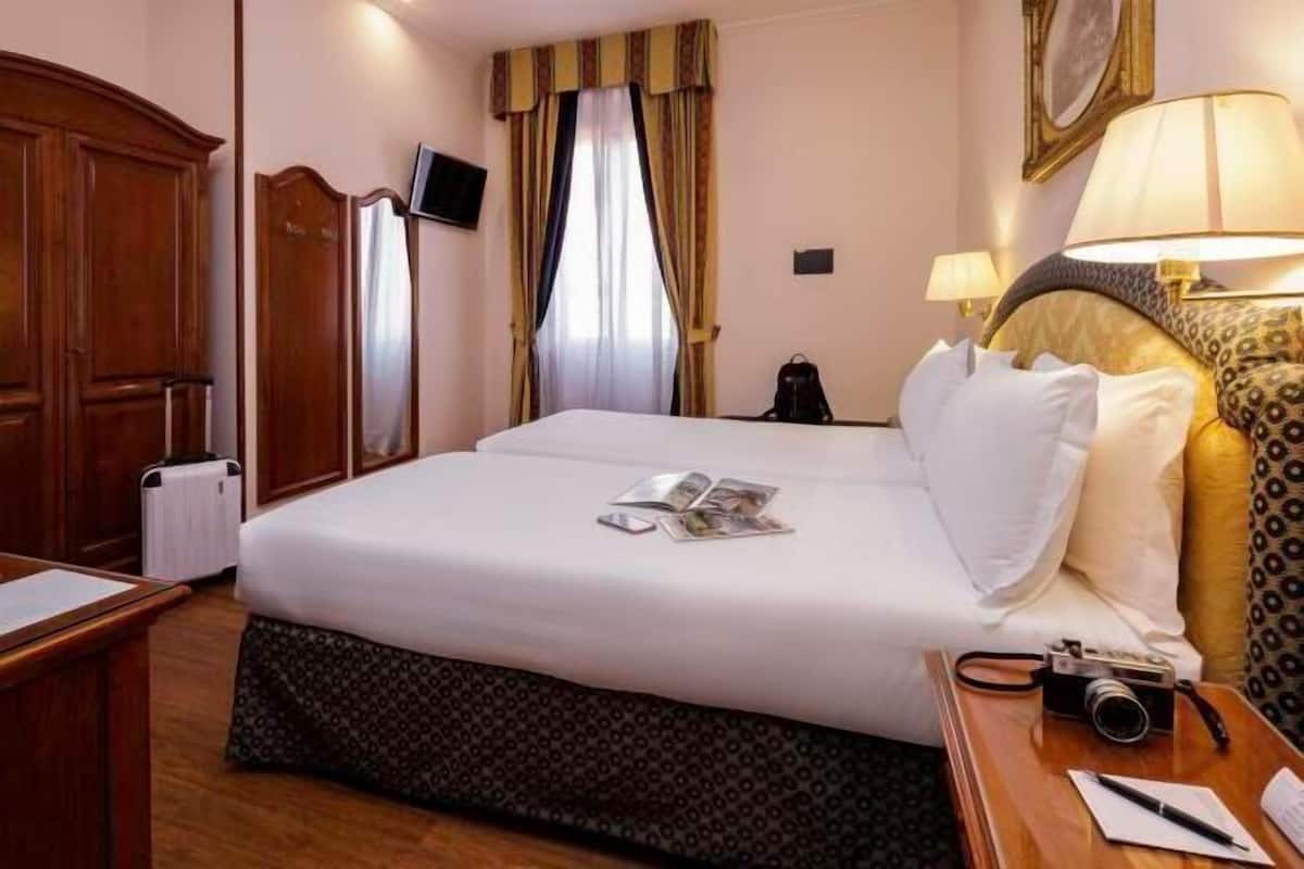 Hypo-allergenic bedding, minibar, in-room safe, desk