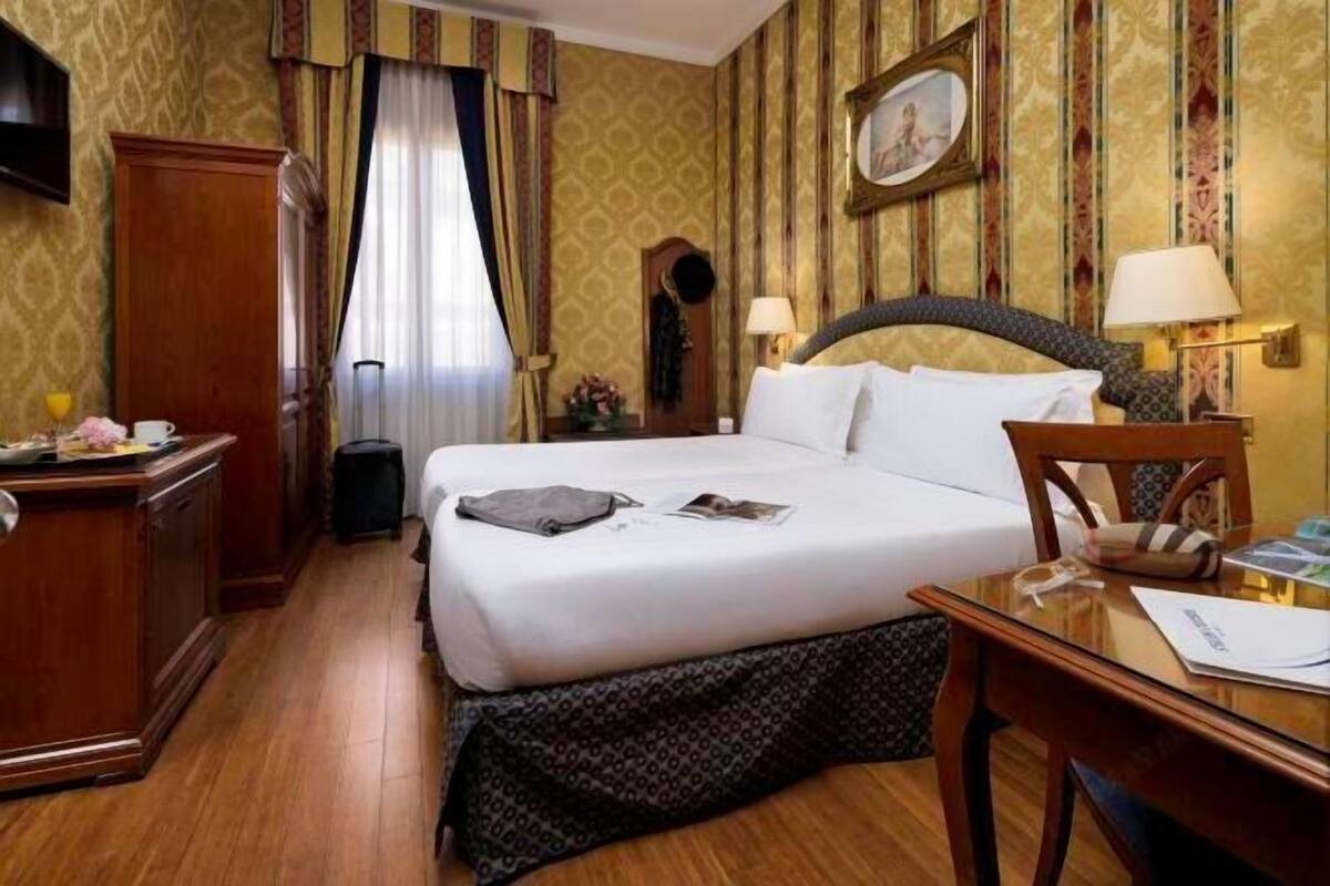 Biancheria da letto ipoallergenica, minibar, una cassaforte in camera