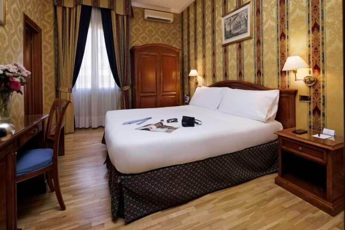 Biancheria da letto ipoallergenica, minibar, una cassaforte in camera