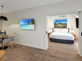 Deluxe Suite, 1 King Bed | Desk, blackout drapes, iron/ironing board, free cribs/infant beds