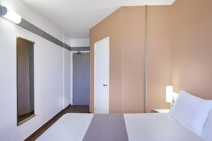 Minibar, blackout curtains, soundproofing, iron/ironing board