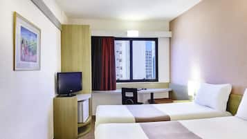 Standard Apartment, 2 Twin Beds | Minibar, blackout drapes, soundproofing, iron/ironing board