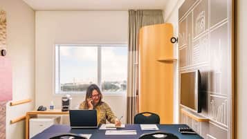 Minibar, blackout drapes, soundproofing, iron/ironing board
