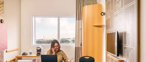 Minibar, blackout drapes, soundproofing, iron/ironing board