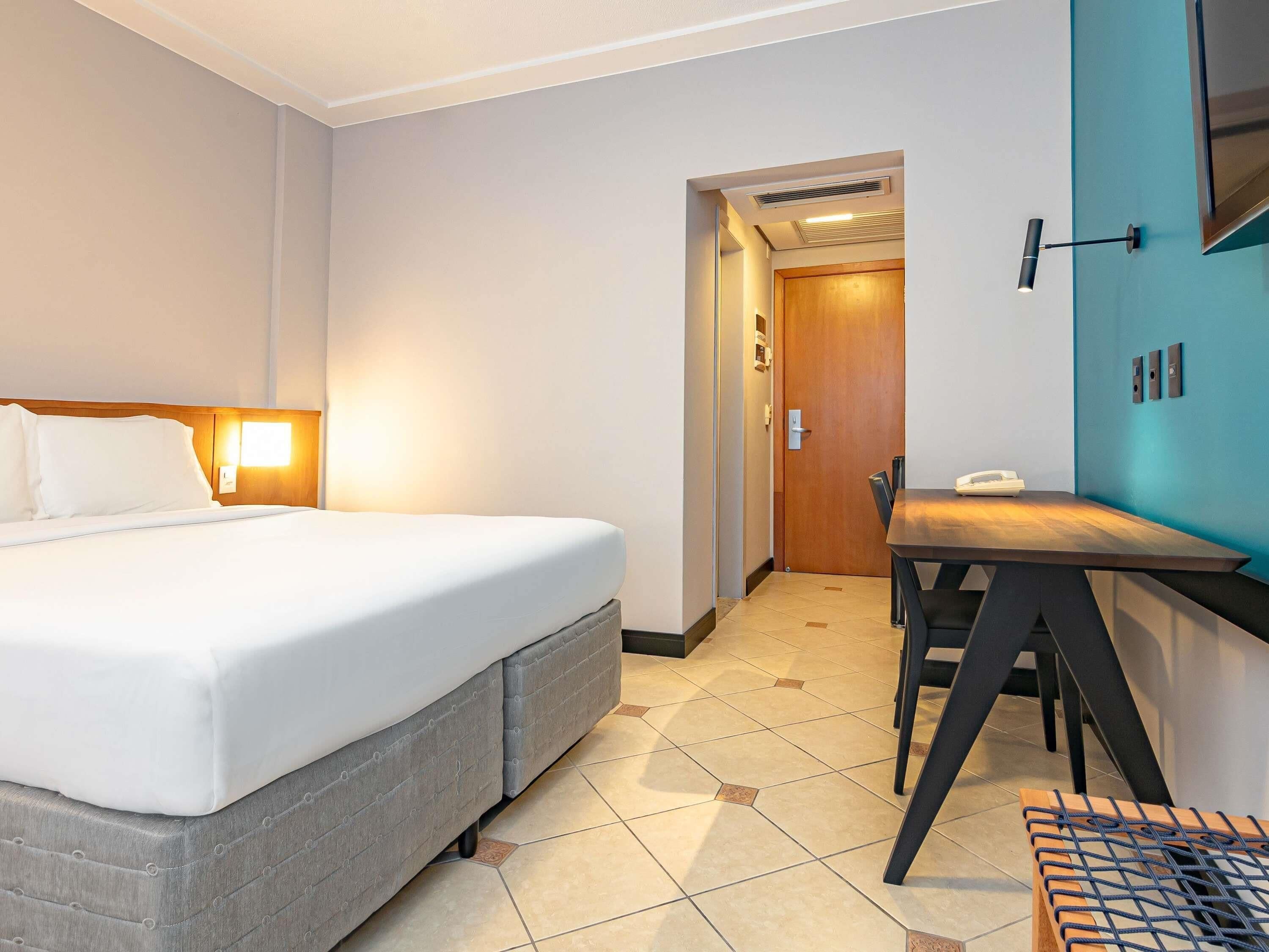 Hypo-allergenic bedding, minibar, in-room safe, desk