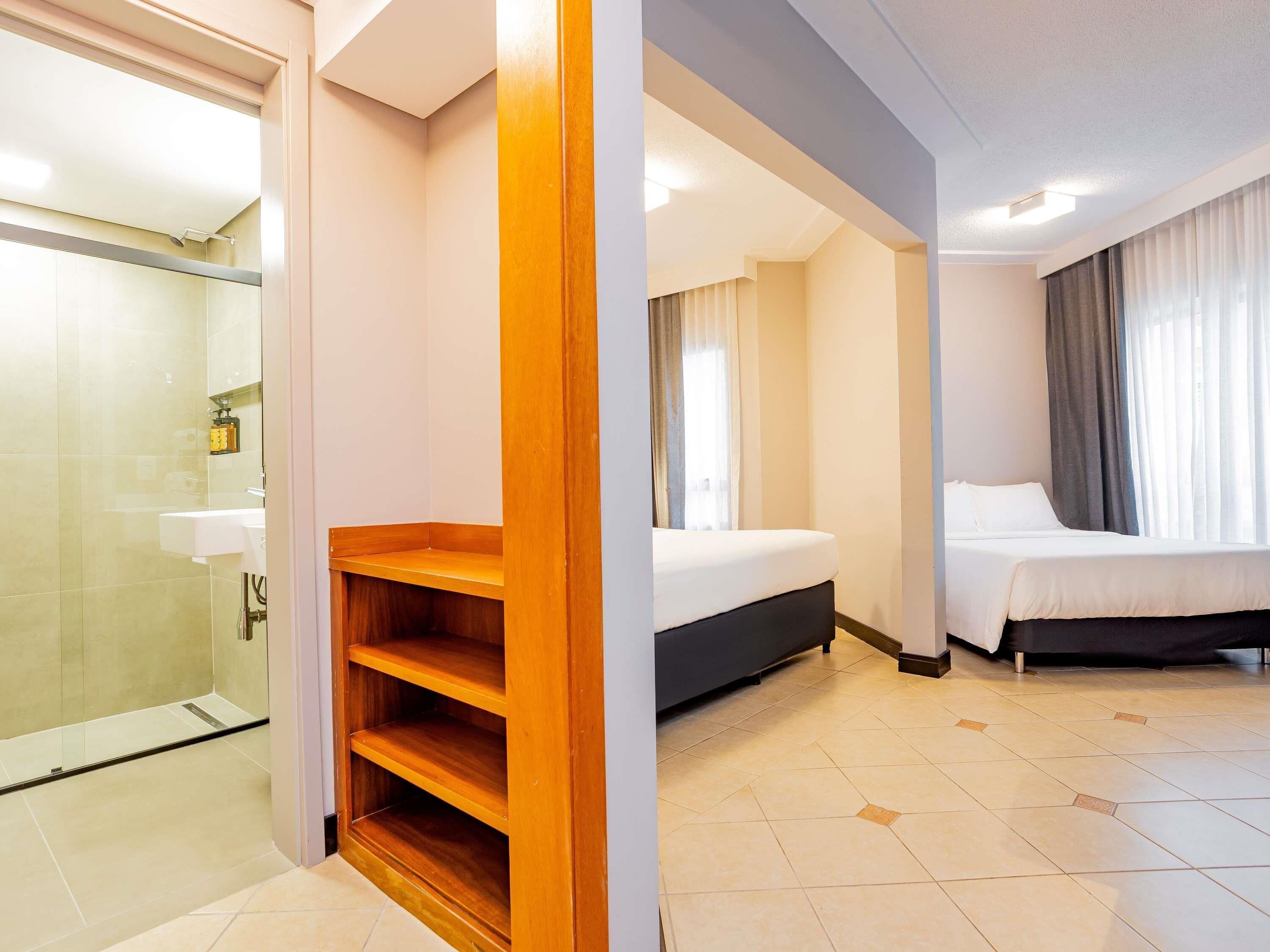 Family Room, 2 Double Beds | Hypo-allergenic bedding, minibar, in-room safe, desk