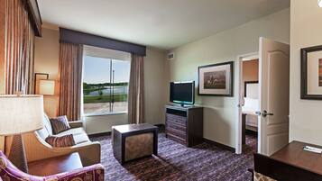 Suite, 1 King Bed, Non Smoking, Lake View | In-room safe, desk, iron/ironing board, free rollaway beds