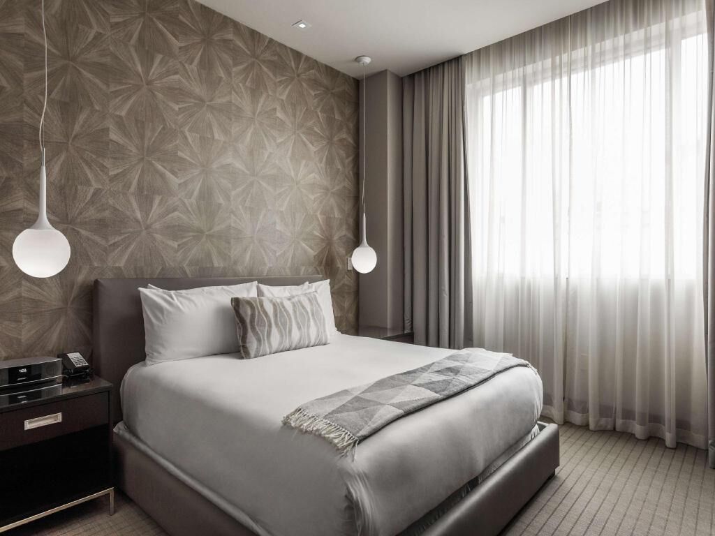 Premium bedding, pillow-top beds, minibar, in-room safe