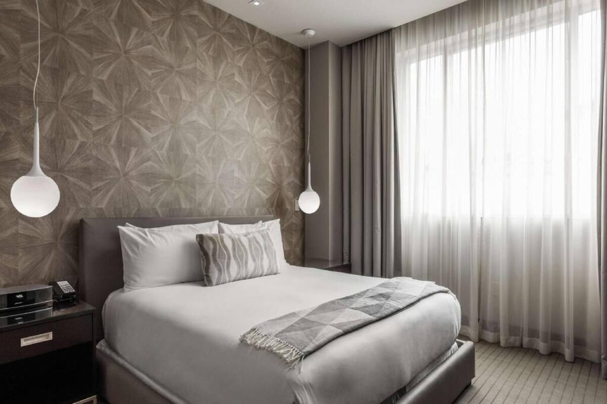 Premium bedding, pillow-top beds, minibar, in-room safe