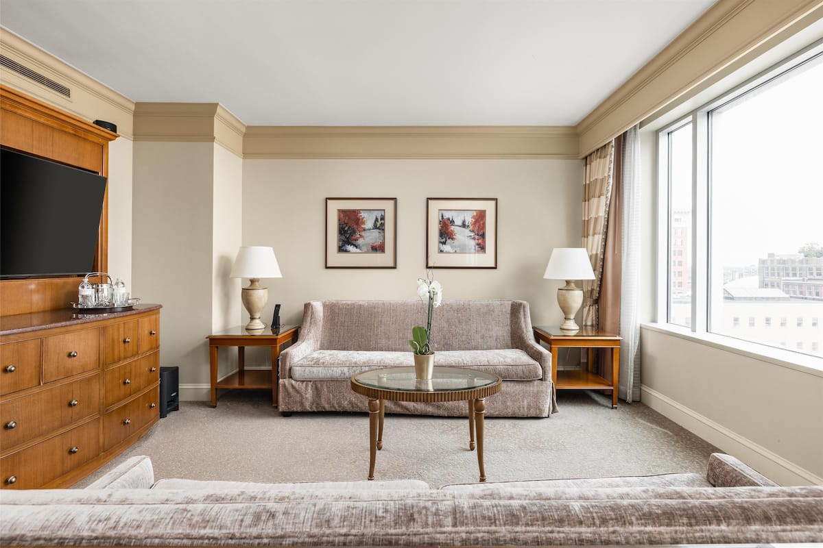 Suite, 1 King Bed | Living area | LED TV