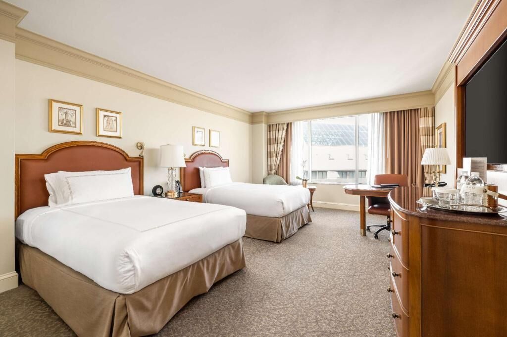 Premium bedding, pillow-top beds, minibar, in-room safe