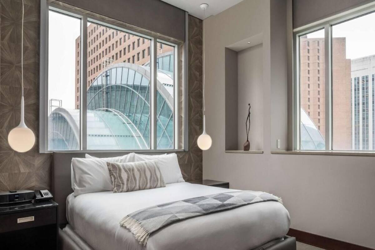 Premium bedding, pillow-top beds, minibar, in-room safe