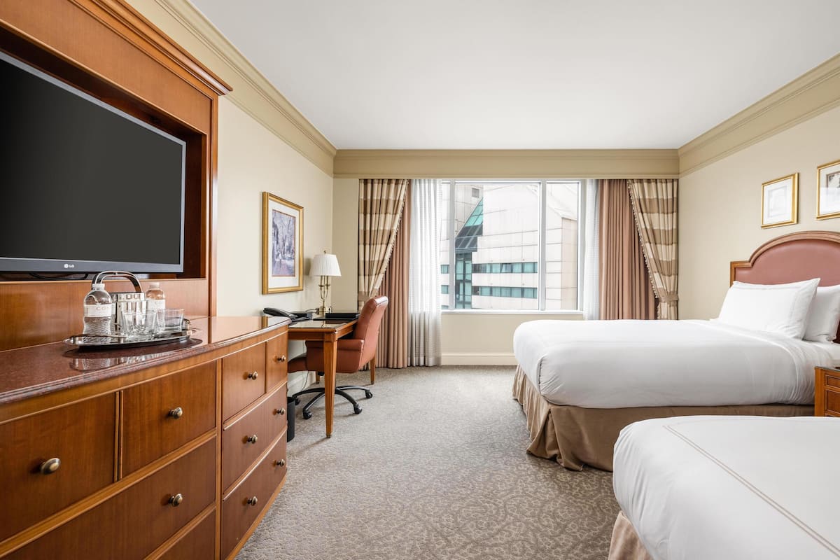 Premium bedding, pillow-top beds, minibar, in-room safe